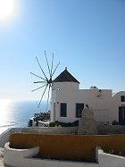 A picture of a windmill in Oia